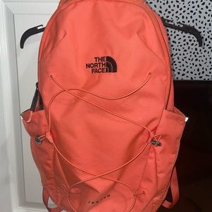 The north face orange woman’s jester backpack